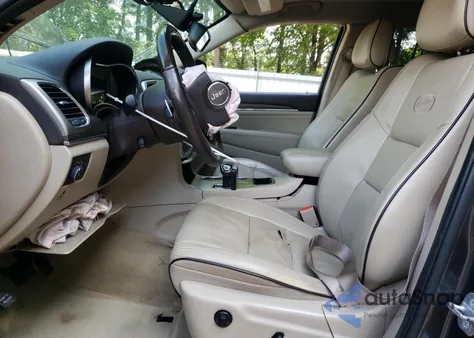 2014 Jeep Grand Cherokee Overland из США, поврежденный, VIN 1C4RJECG6EC322366